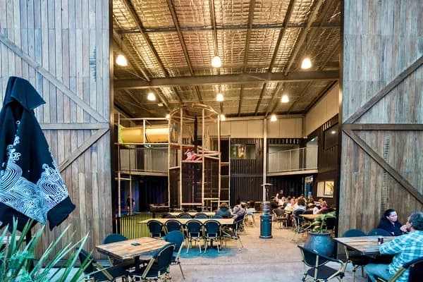 The Whole Venue at The 383 Wooli — containers, courtyard and Playpen